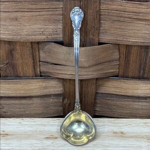 Elegant Sterling Silver Serving Spoon